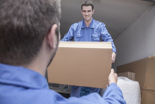Professional packing team handling boxes