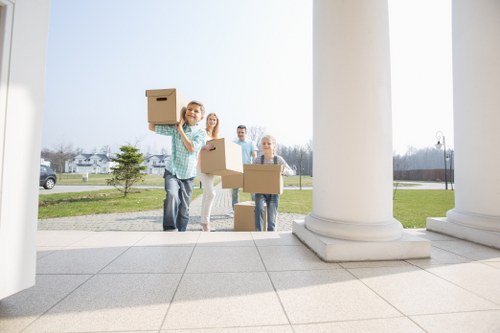 Professional movers assisting with loading items