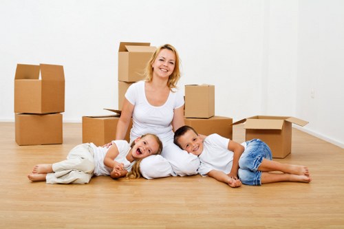 Professional movers discussing service options